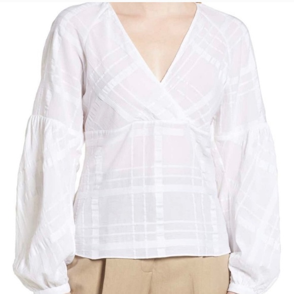Lewit crossover weave patterned top